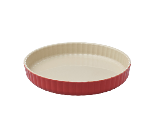 Moule à tarte en céramique Pyrex® de couleur rouge corail à l'extérieur.