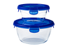 Lot de deux boites de conservation ronde en verre Pyrex® avec couvercle étanche en plastique de couleur bleue.