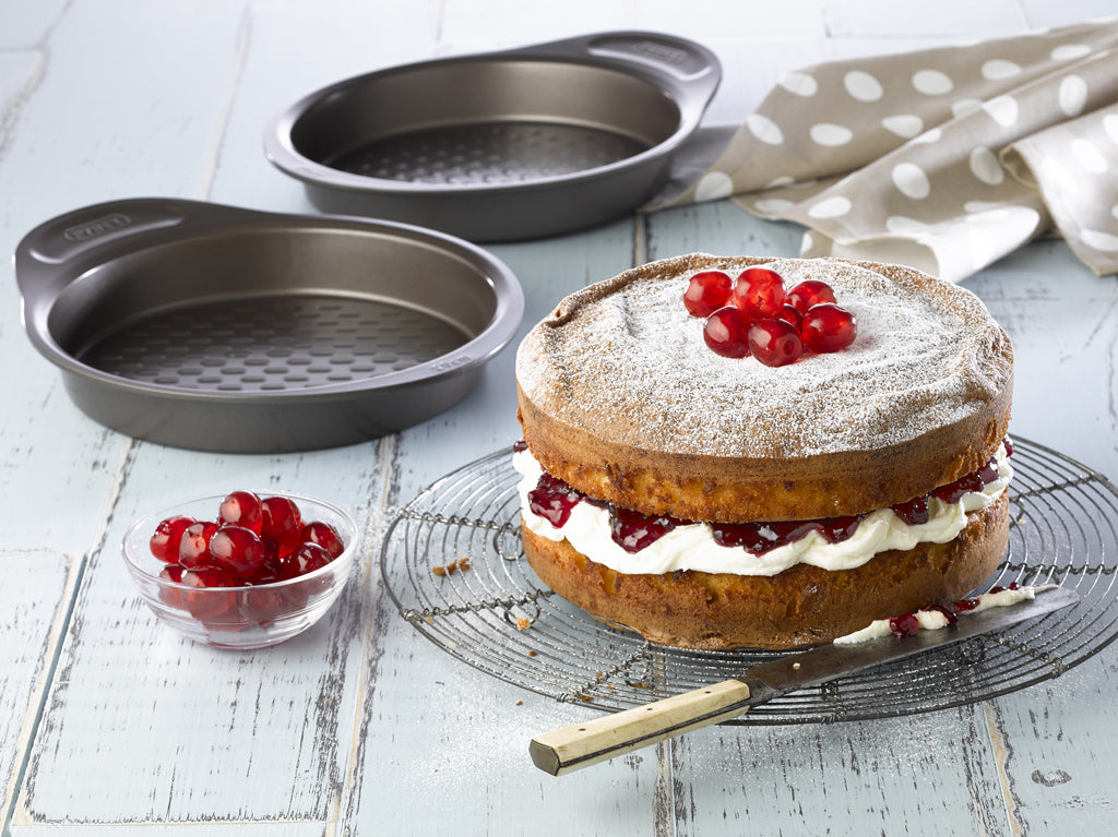 asimetriA - Moule à manqué en métal avec prise en main facile