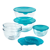 Lot de cinq bols en verre avec couvercles en plastique de couleur bleue.