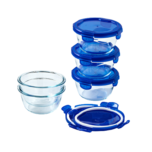 Lot de cinq boites de conservation ronde en verre Pyrex® avec couvercle en plastique étanche de couleur bleue.