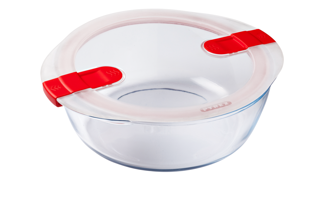 Plat rond en verre avec couvercle en plastique à valves vapeur compatible micro-ondes.